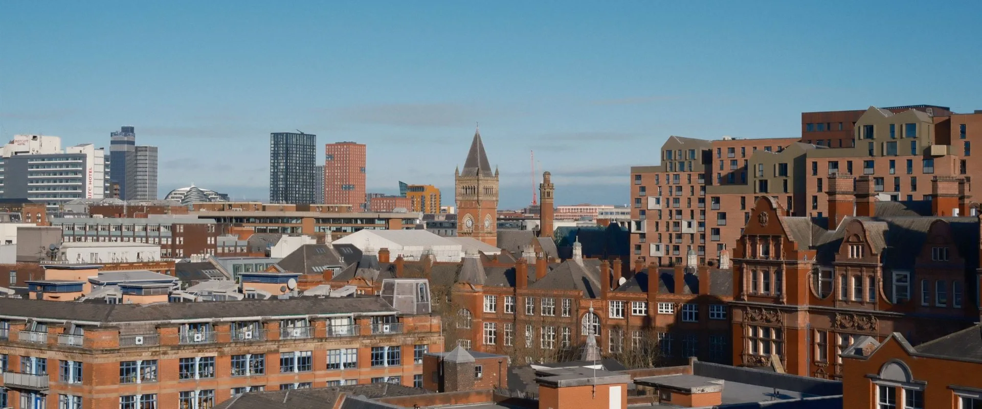 The Manchester skyline, with the city’s Victorian rooftops in the foreground.